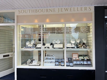 The Southbourne Jewellers shop window at 38 Southbourne Grove, filled with necklaces, earrings and watches